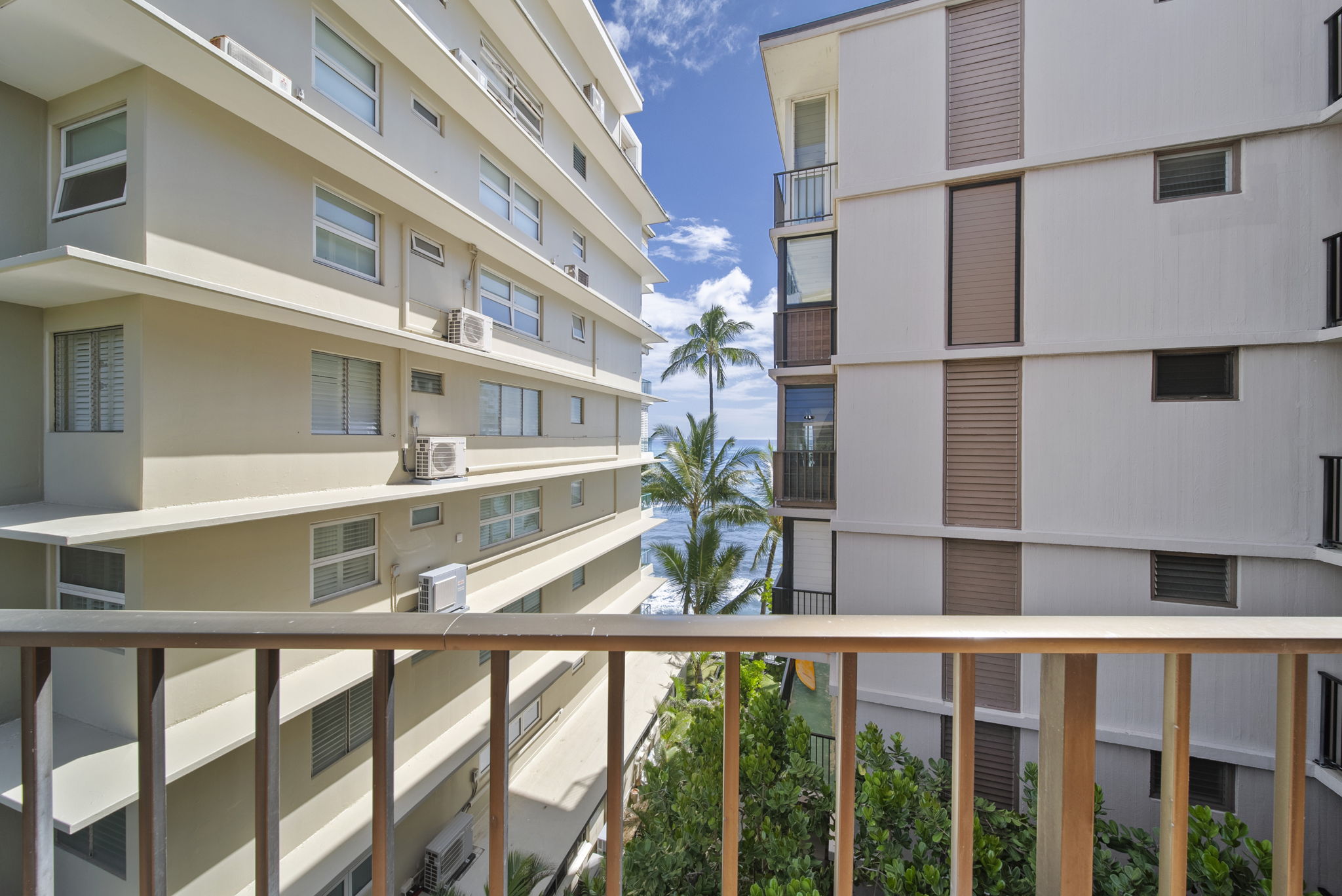Pacific view framed between neighboring buildings