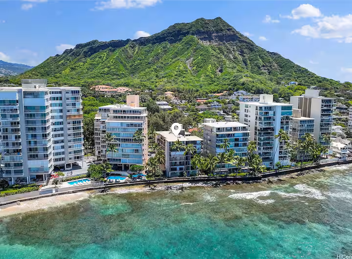 Aerial view of the condo building beneath Diamond Head